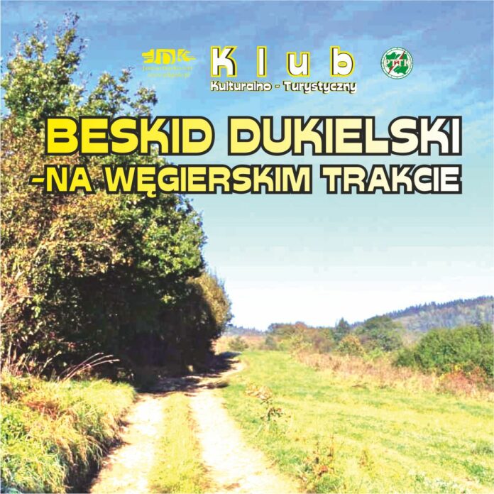 Obraz zawiera: Zdjęcie drzew, krzewów i traw na górzystym terenie, na pierwszym planie polną ściezkę wijącą się wśród traw. W górnej części zdjęcia logo JDK i PTTK oraz tekst: Klub Kulturalno - Turystyczny. Beskid Dukielski - na węgierskim trakcie