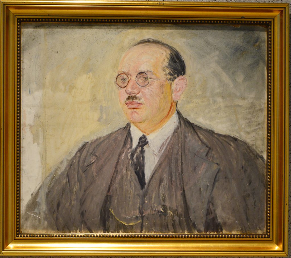 Ignacy Pinkas: Portret doktora Wensteina. Popiersie mężczyzny w okularach, w ciemnej marynarce i krawacie