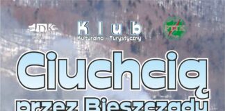 KK-T JDK i PTTK Jasło zapraszają: Ciuchcią przez Bieszczady Afisz w kolorystyce niebieskiej z pociągiem w tle, informujący o wycieczce w Bieszczady