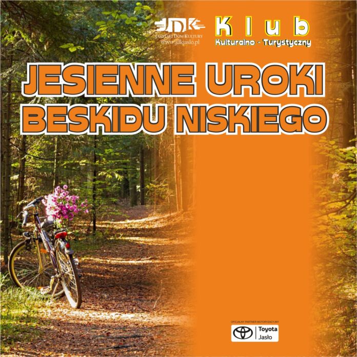 Obraz zawiera: Zdjęcie lasu, z rowerem przy ścieżce leśnej. U góry na środku logo JDK, na dole w prawej części plakatu logo Toyoty Jasło, oficjalnego partnera motoryzacyjnego oraz tekst: Klub Kulturalno - Turystyczny. Jesienne Uroki Beskidu Niskiego.